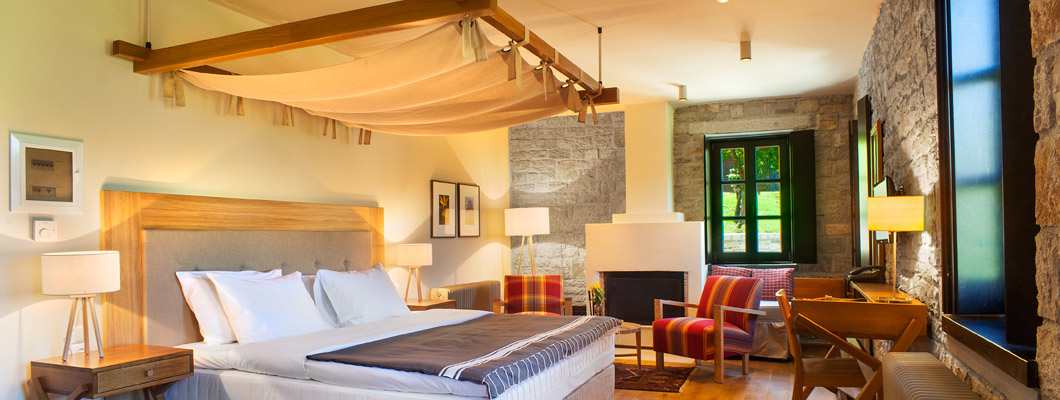 Select green hotels arising mountain resort Greece honeymoon suite