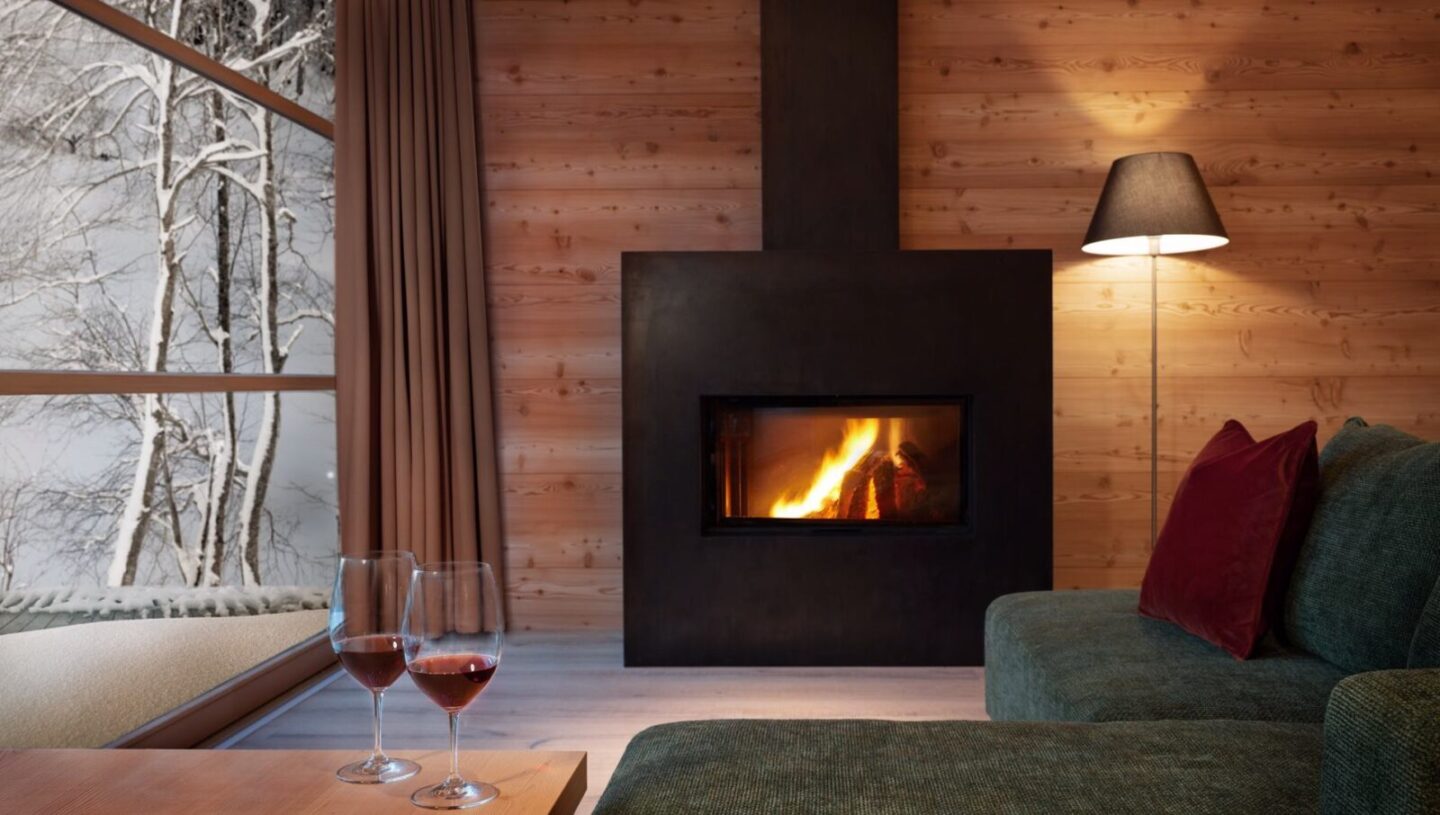 Adler Lodge Ritten Kaminfeuer im Winter