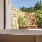Select Green Hotels Cas Gasi Agroturismo Ibiza bathroom with outdoor space