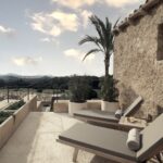 Select Green Hotels Es Raco d'Arta Mallorca Casita sunbeds on terrace