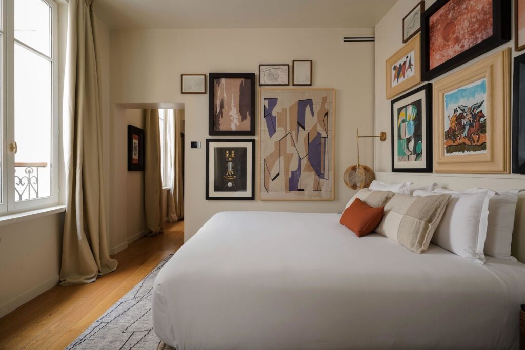 Select Green Hotels Pulitzer Paris Suite with lots of artwork