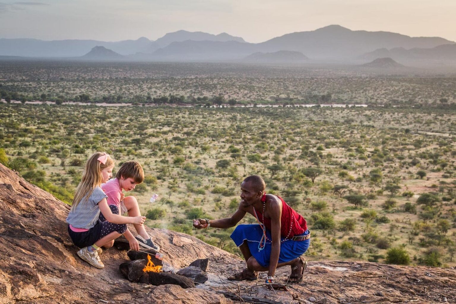 Select Green Hotels Sasaab Safari Lodge roasting marshmallows bush fire
