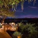 Select Green Hotels Sasaab Safari Lodge exterior deck at night
