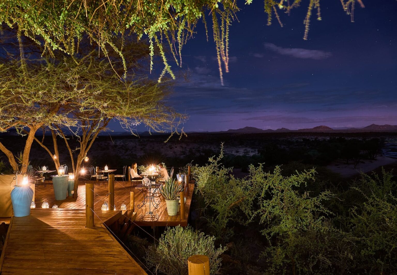 Select Green Hotels Sasaab Safari Lodge exterior deck at night
