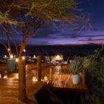 Select Green Hotels Sasaab Safari Lodge exterior deck at night