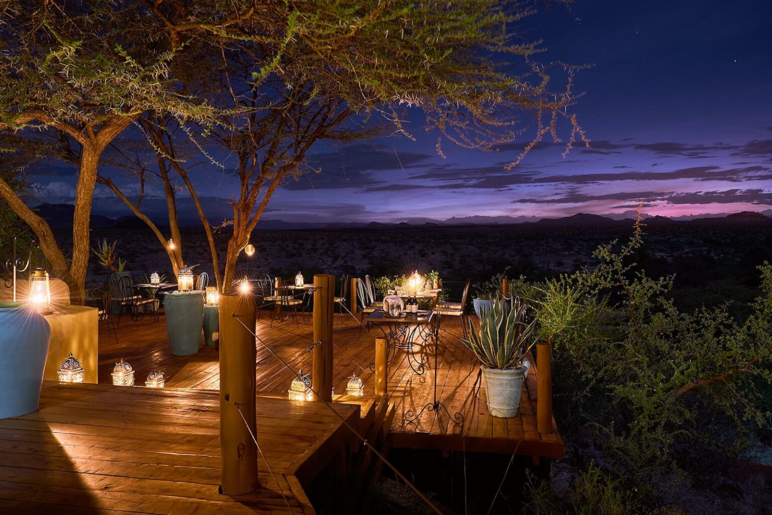 Select Green Hotels Sasaab Safari Lodge exterior deck at night