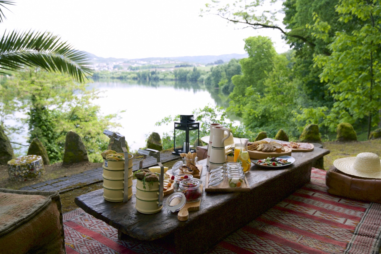 Select Green Hotels Six Senses Douro Valley picnic by the river