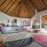 Select Green Hotels Solio Lodge cottage bedroom