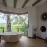 Select Green Hotels Solio Lodge bathroom with a view