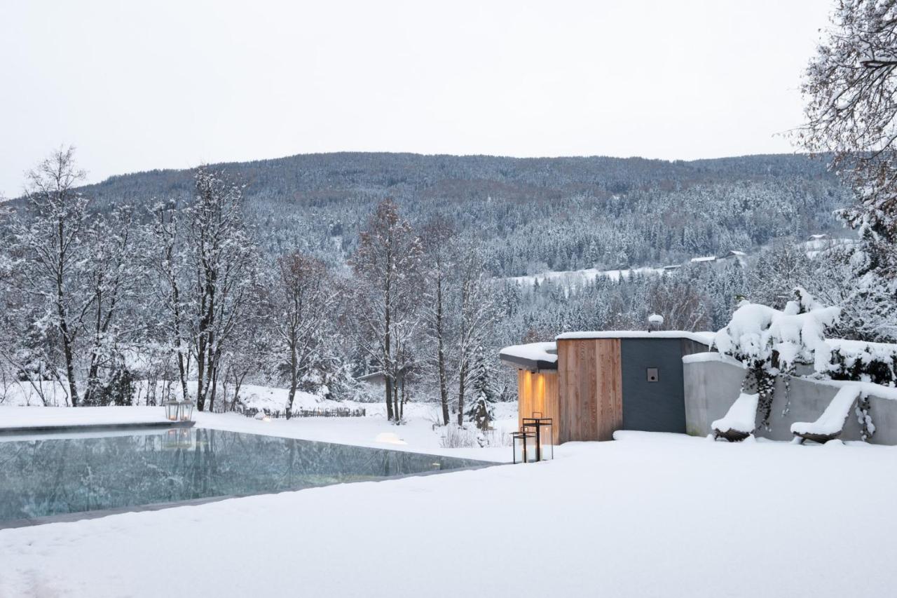 Tauber's Bio Vitalhotel pool im Schnee heated outdoor pool