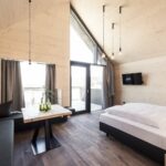 Select Green Hotels Naturhotel Pfösl Südtirol Dolomiten Wald Chalet