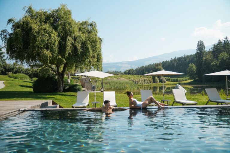 Select Green Hotels Seehof Nature Retreat Adults-Only Hotel couple by the pool