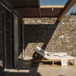 Stamna Sifnos Select Green Hotels outdoor sunbeds with greek style architecture